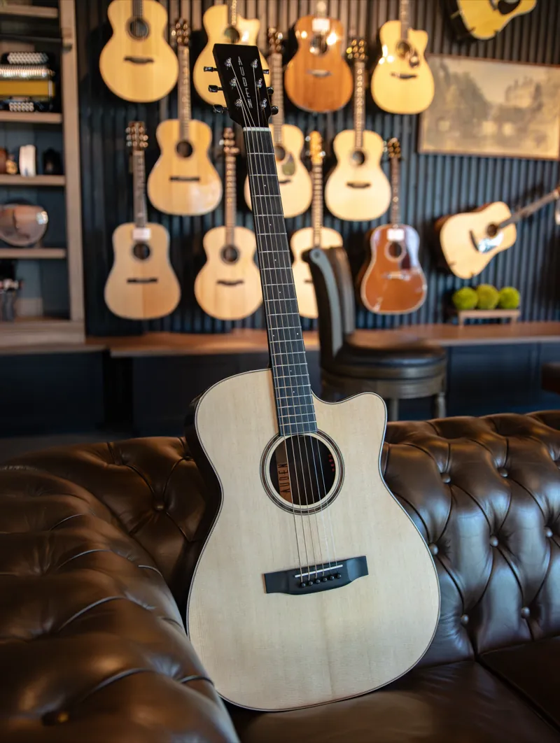 An acoustic guitar in the Corzic showroom