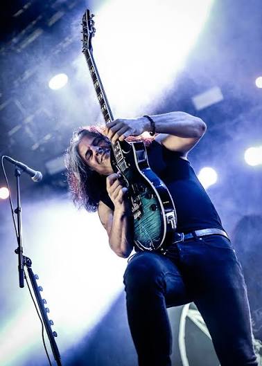 Alex Skolnick playing an ESP guitar on stage