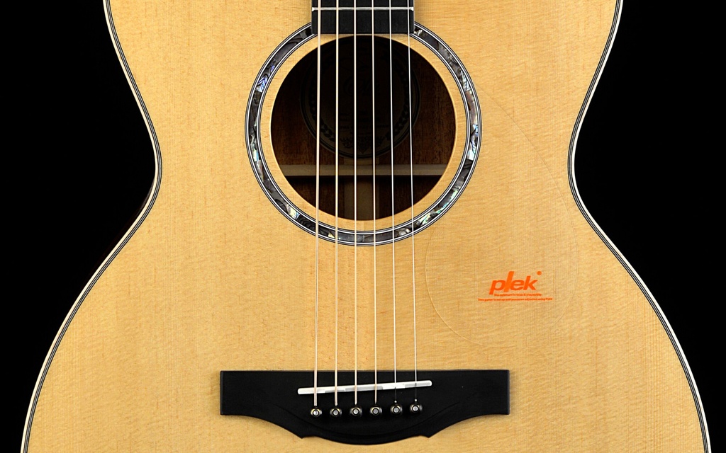 OM1-130soundhole.jpg?format=2500w